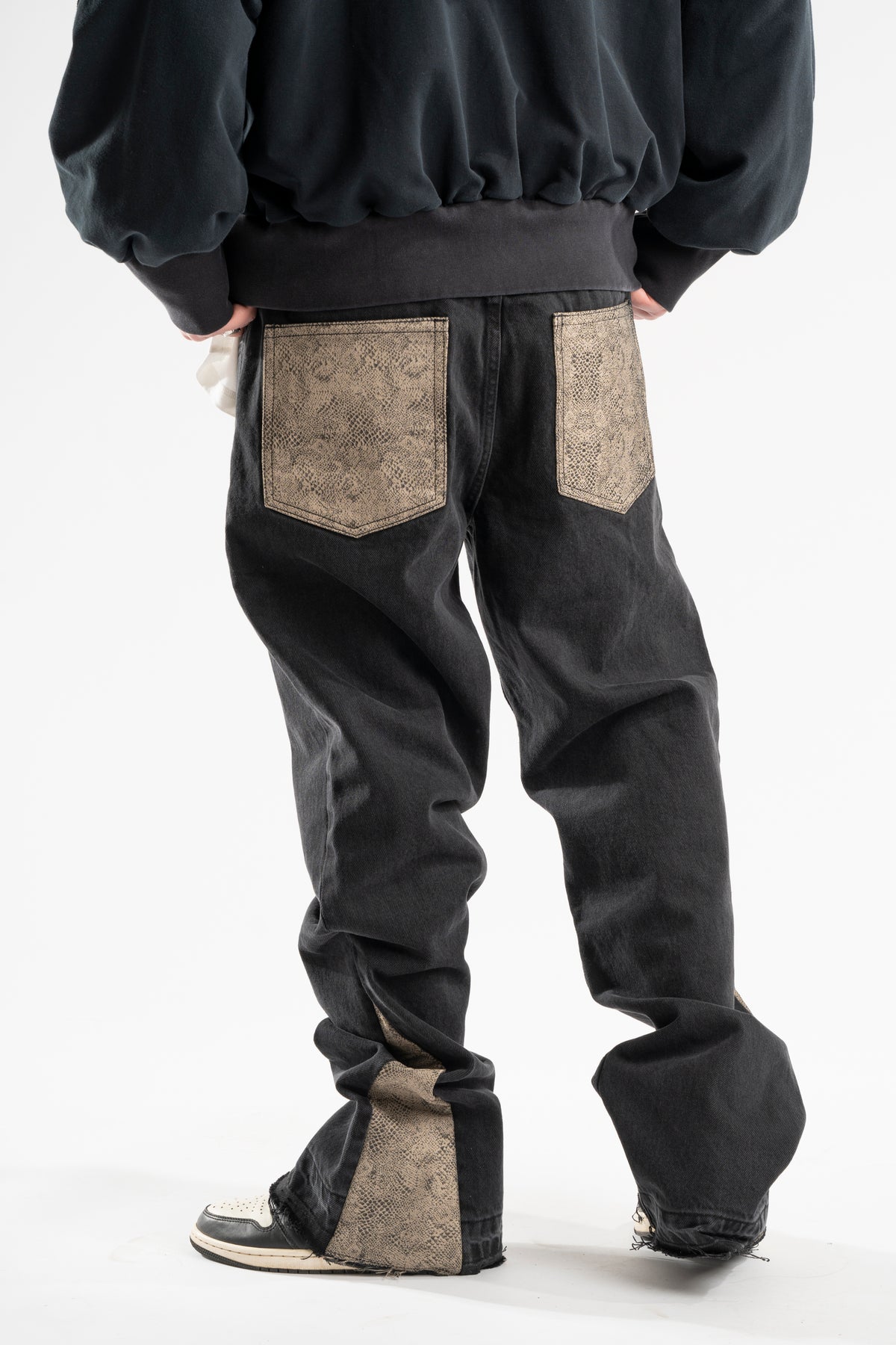FLARED BROWN SNAKE JEANS