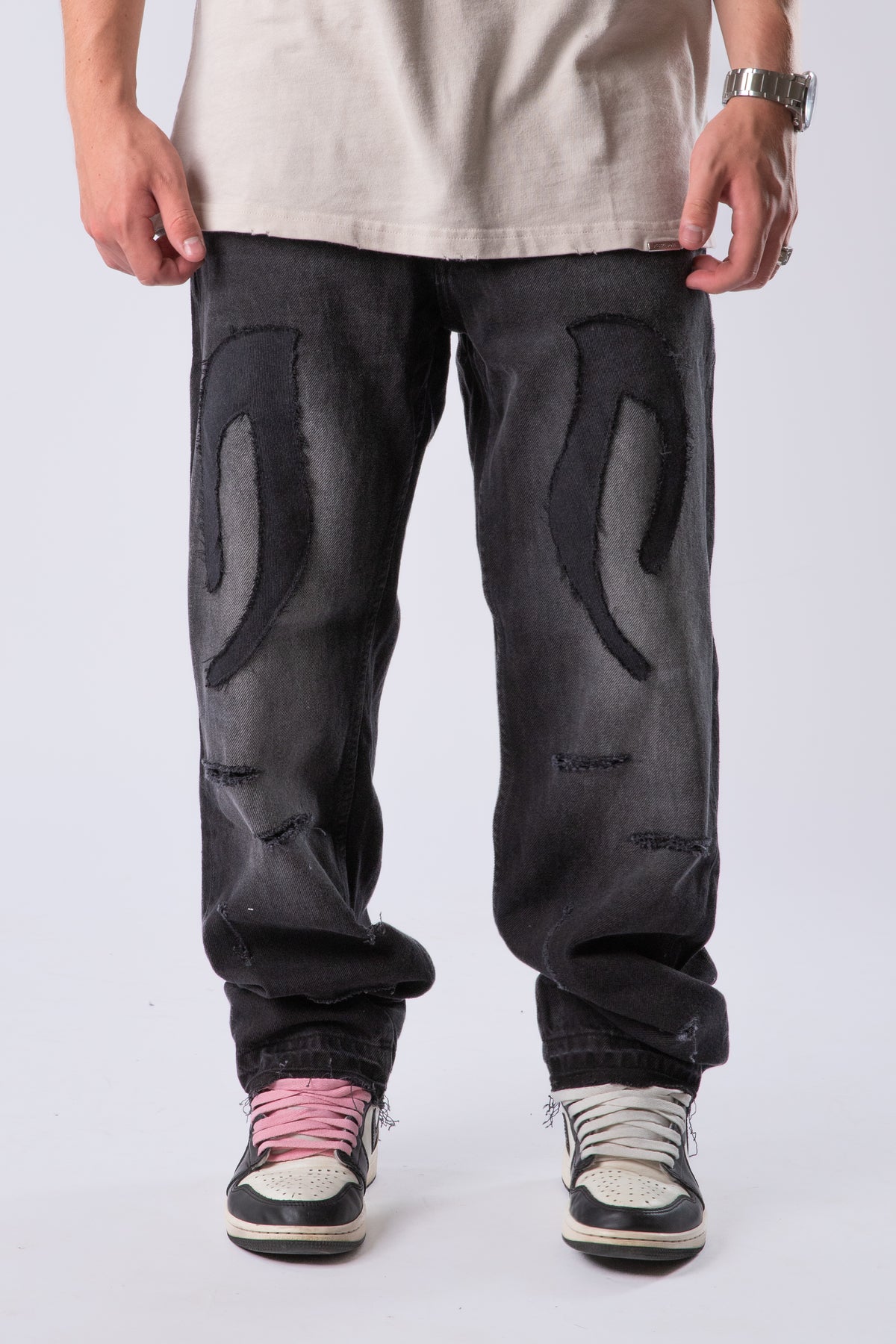 DISTRESSED TRIBAL JEANS