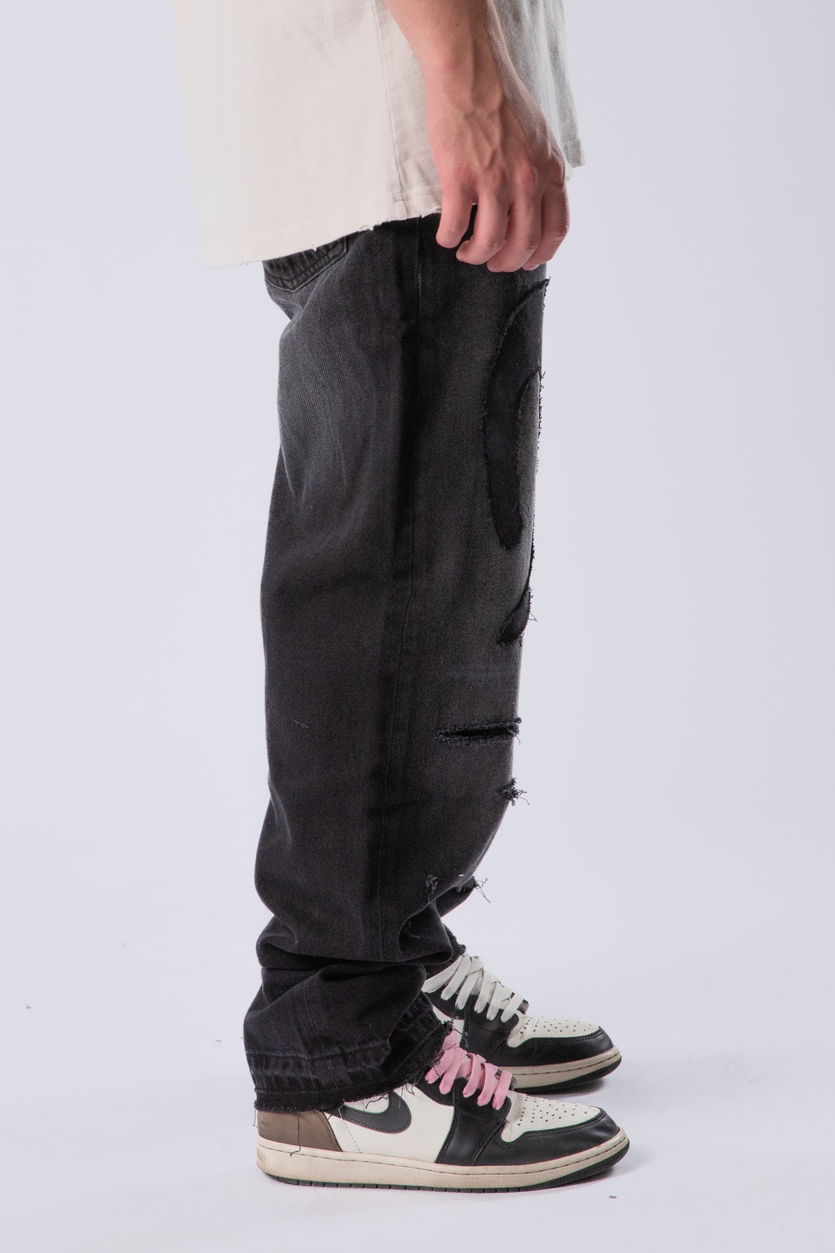 DISTRESSED TRIBAL JEANS