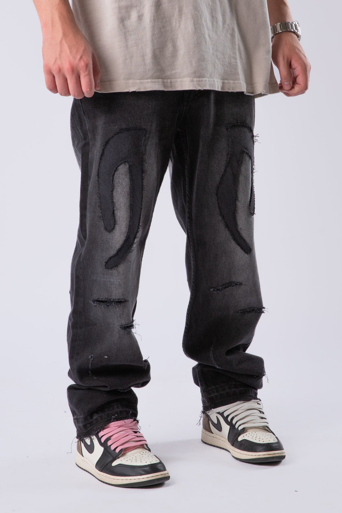 DISTRESSED TRIBAL JEANS
