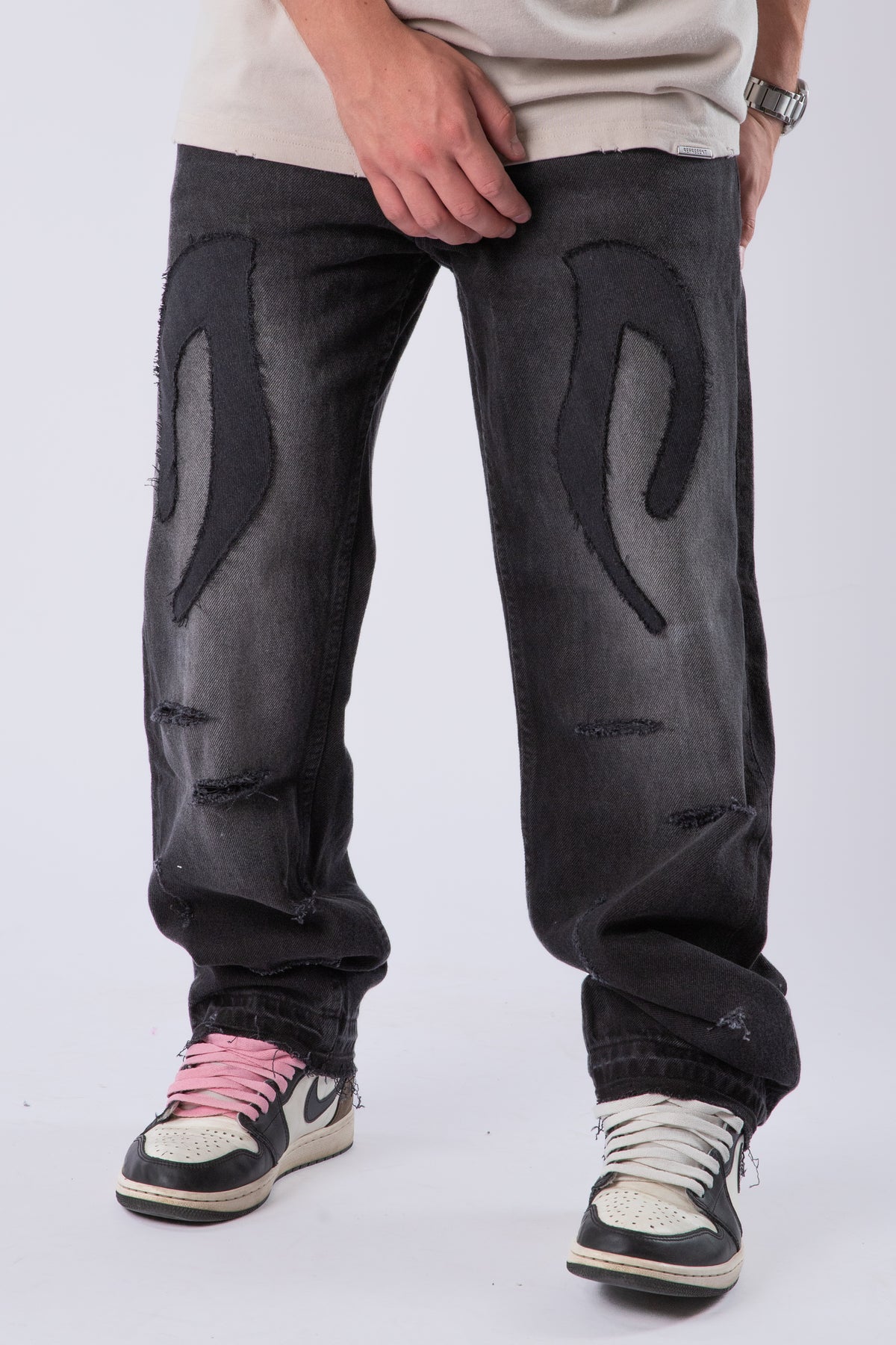 DISTRESSED TRIBAL JEANS
