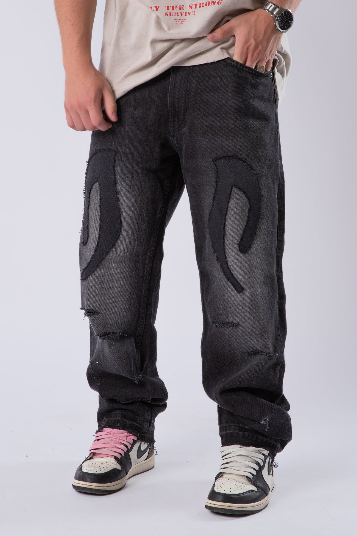 DISTRESSED TRIBAL JEANS