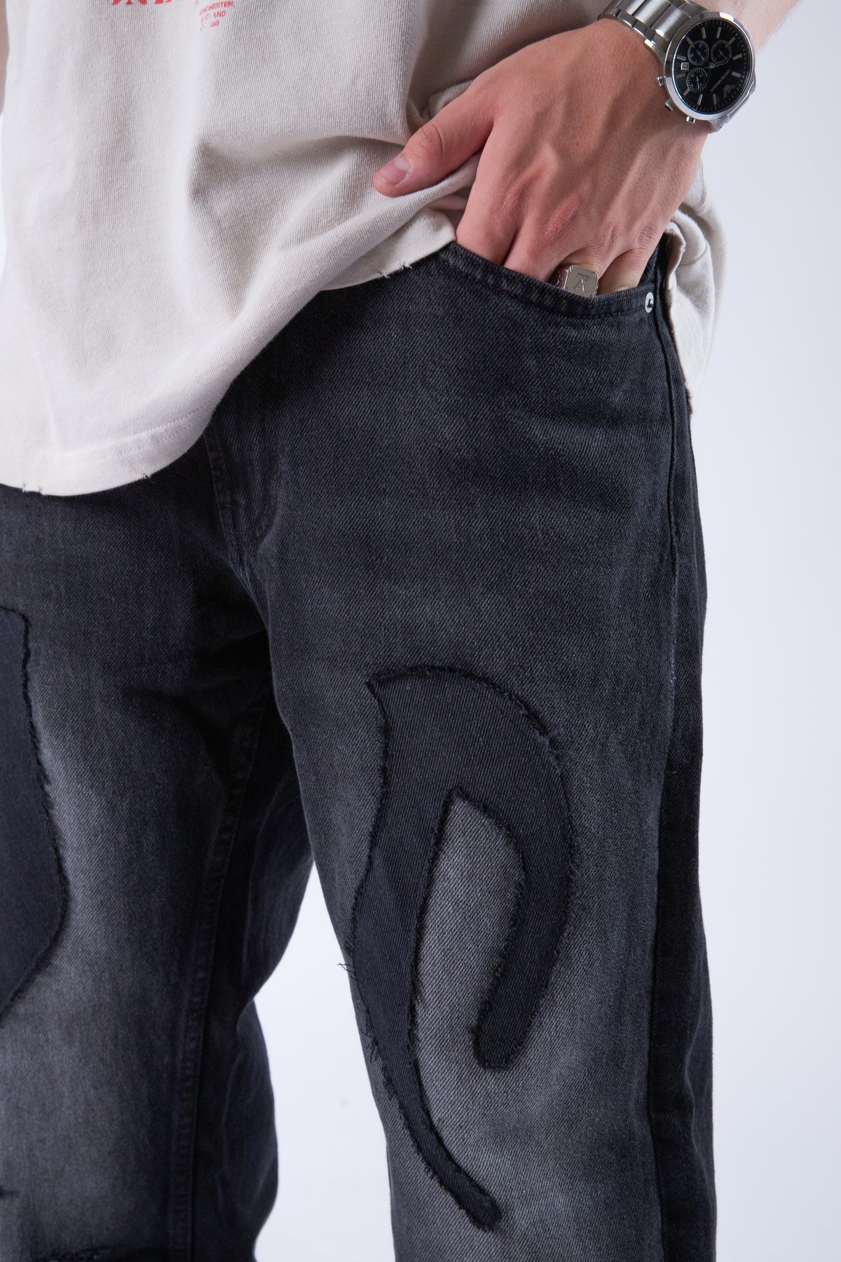 DISTRESSED TRIBAL JEANS