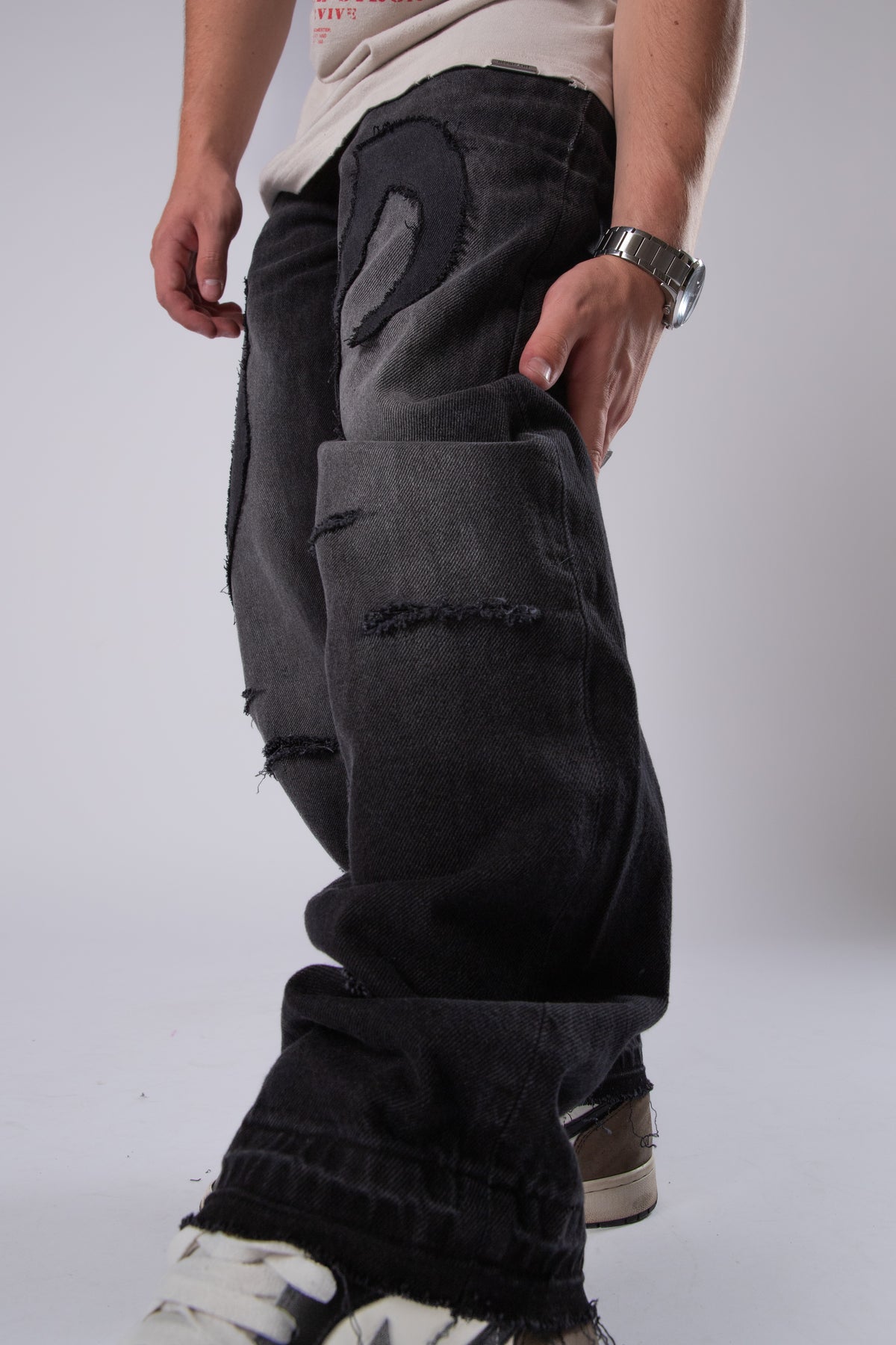 DISTRESSED TRIBAL JEANS